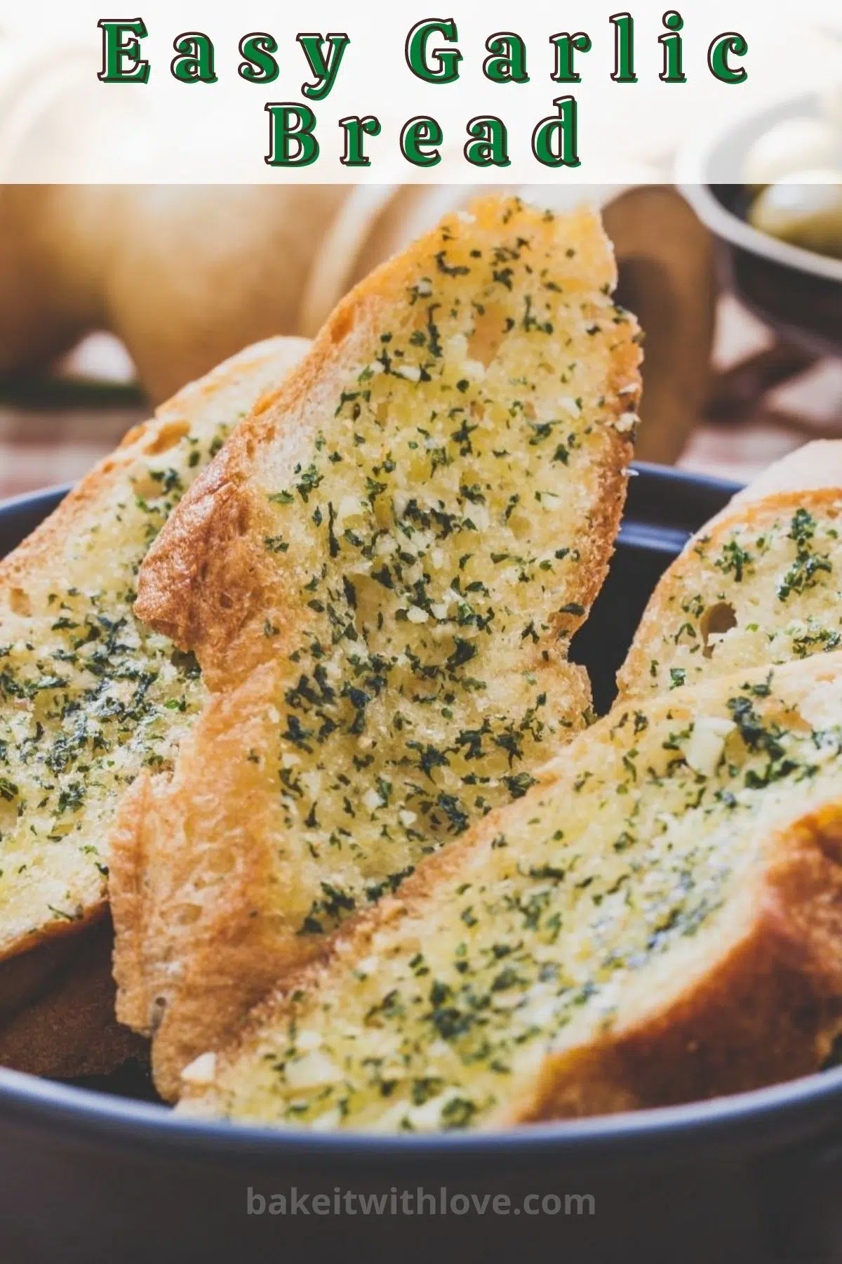 Pin image with text of garlic bread sliced and ready to serve.
