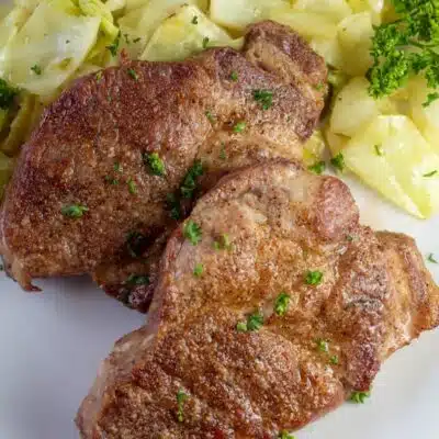 Pin image with text of air fried coppa pork steaks.