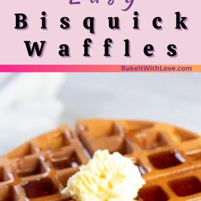 Pin image of bisquick waffles on a white plate with butter and syrup on top.