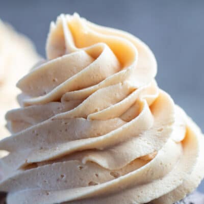 Square close up image of peanut butter buttercream frosting.