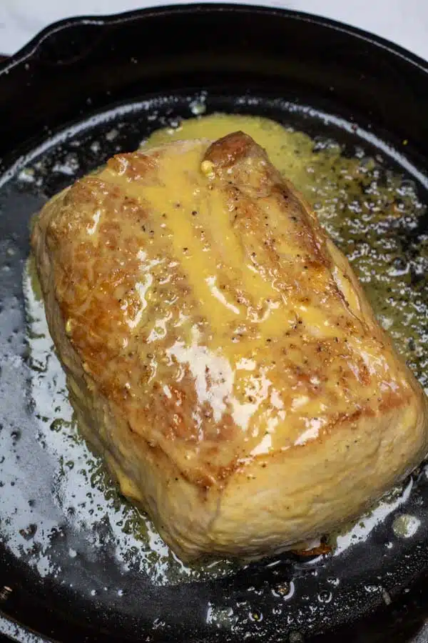 Process image 4 showing pork ribeye baked with glaze.