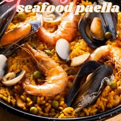 Best Spanish seafood paella recipe pin with text header overlay.