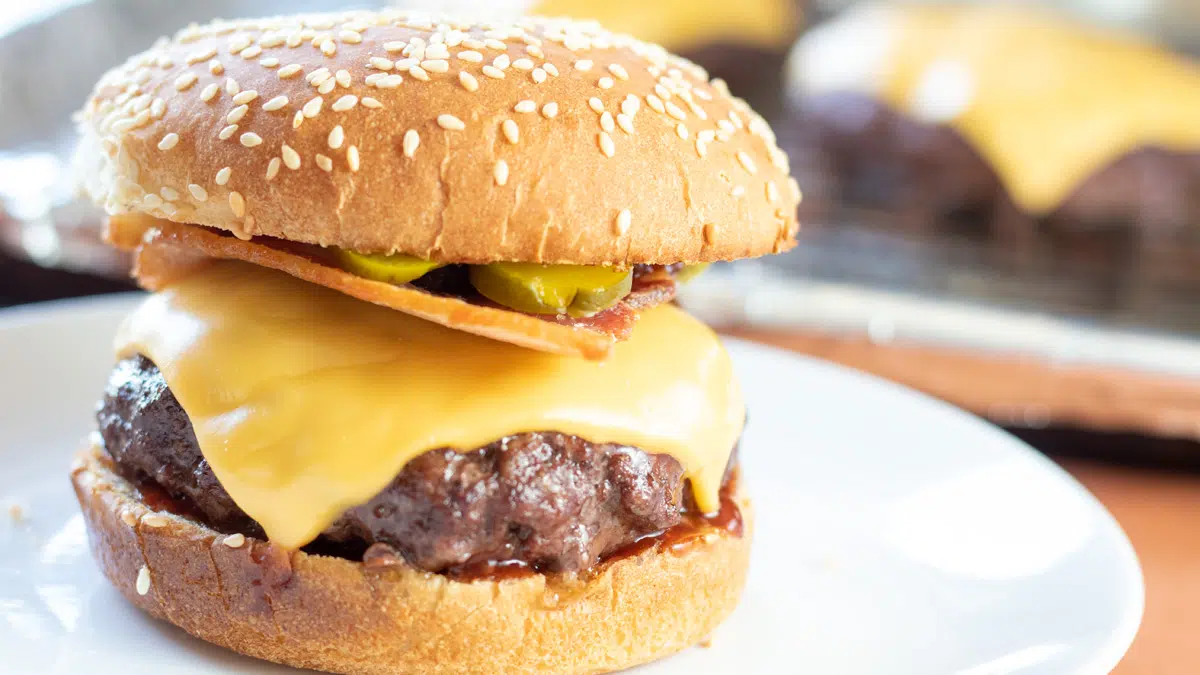 Wide image of baked cheeseburger.