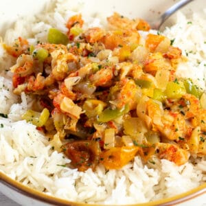 Square closeup image of crawfish etouffee with rice.