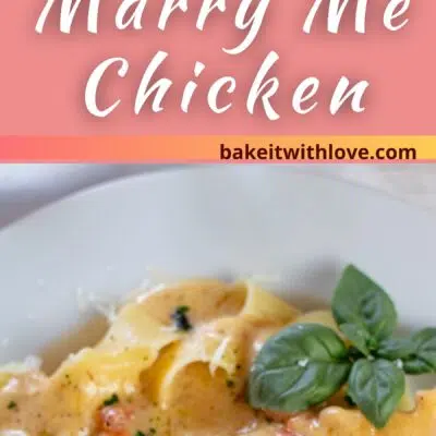Pin image with text of marry me chicken over pasta in a white dish.
