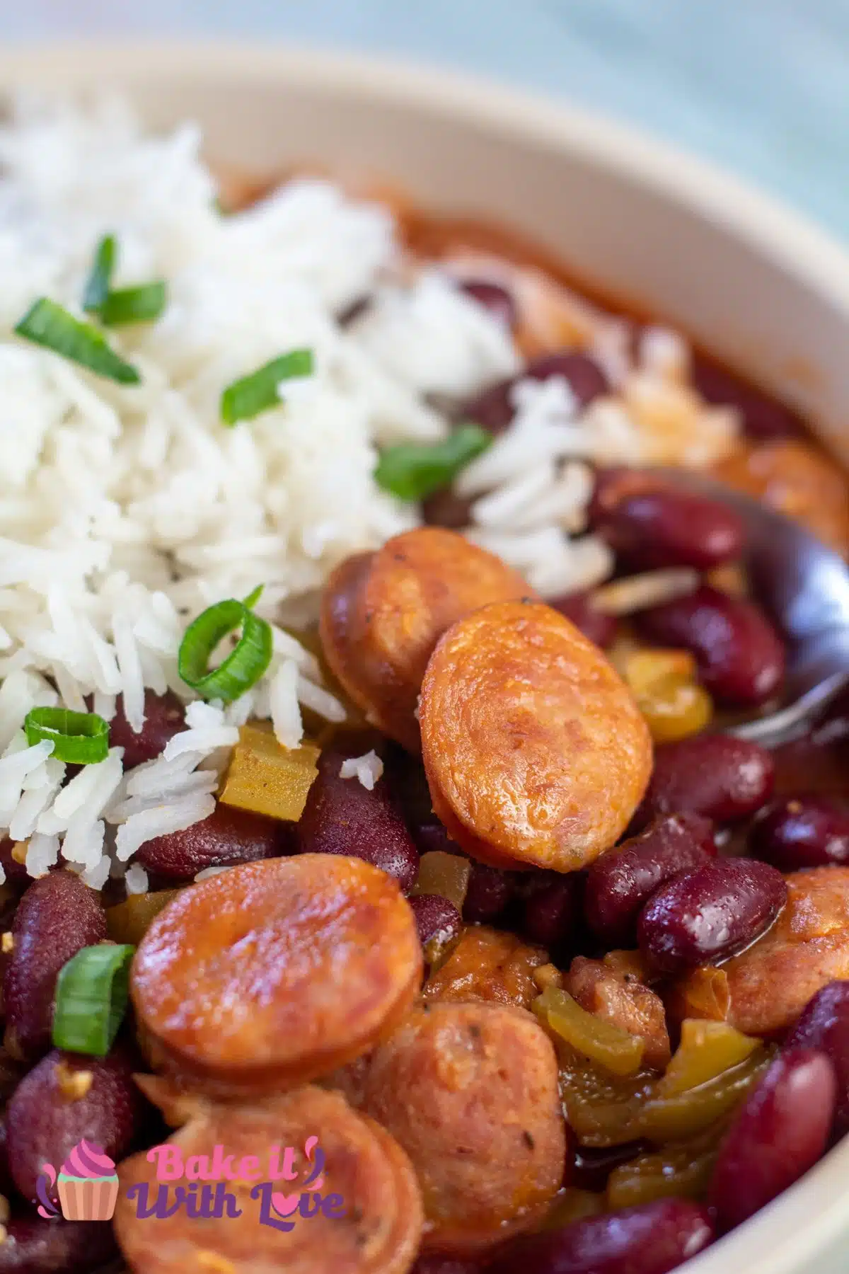 Tall closeup on the best quick and easy red beans and rice with canned beans and andouille sausage.