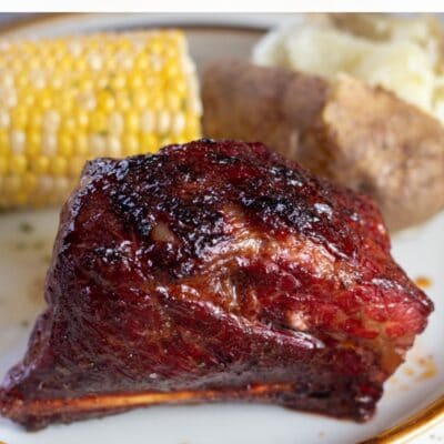 Best smoked short ribs recipe pin with text header.