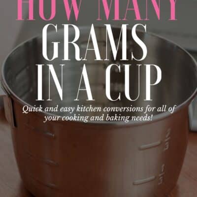 How Many Grams In A Cup pin with text over vignette with measuring cup in background.