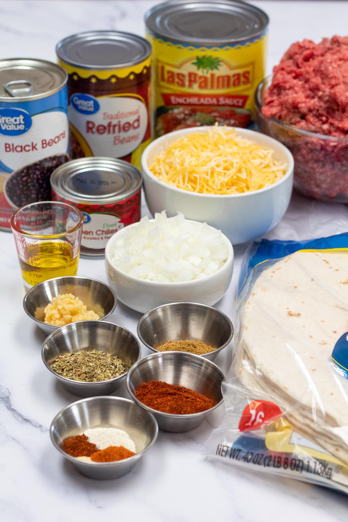 Photo showing ingredients needed for beef enchiladas.