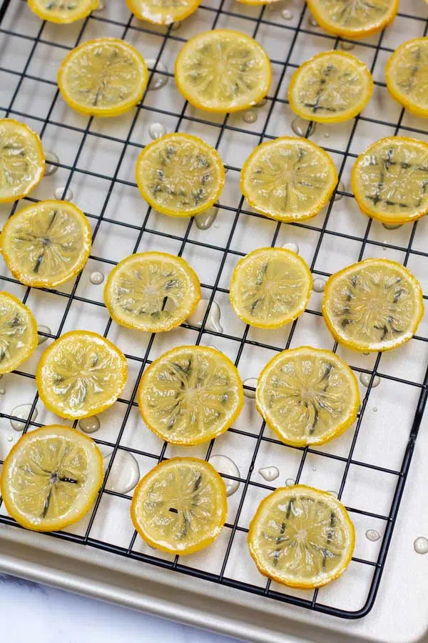 Process image 5 showing sliced lemons resting on wire tray.