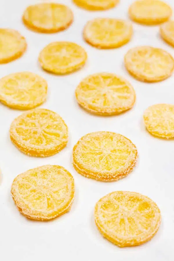 Process image 8 showing sliced lemons coated in sugar on tray.