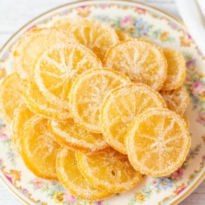 Square image of candied lemon slices.