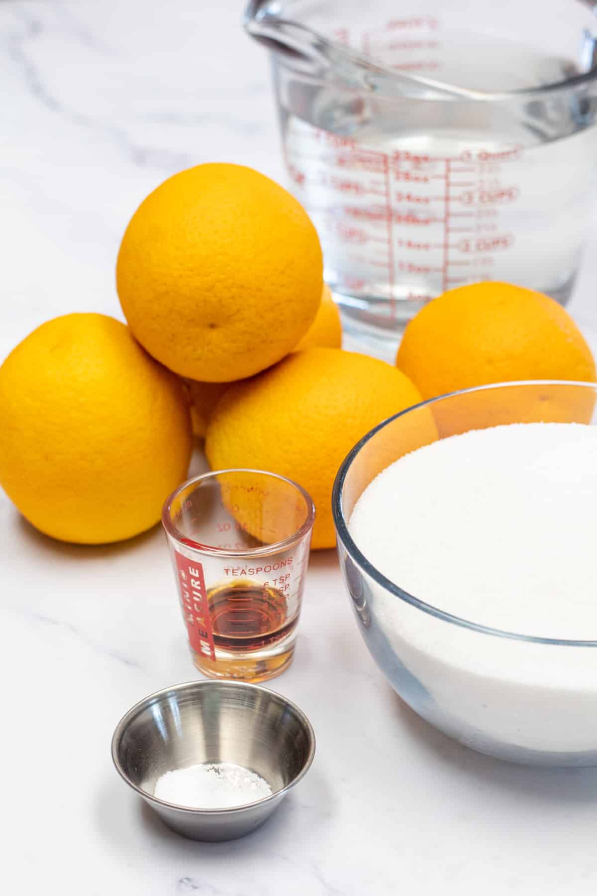 Photo showing ingredients needed for candied oranges.