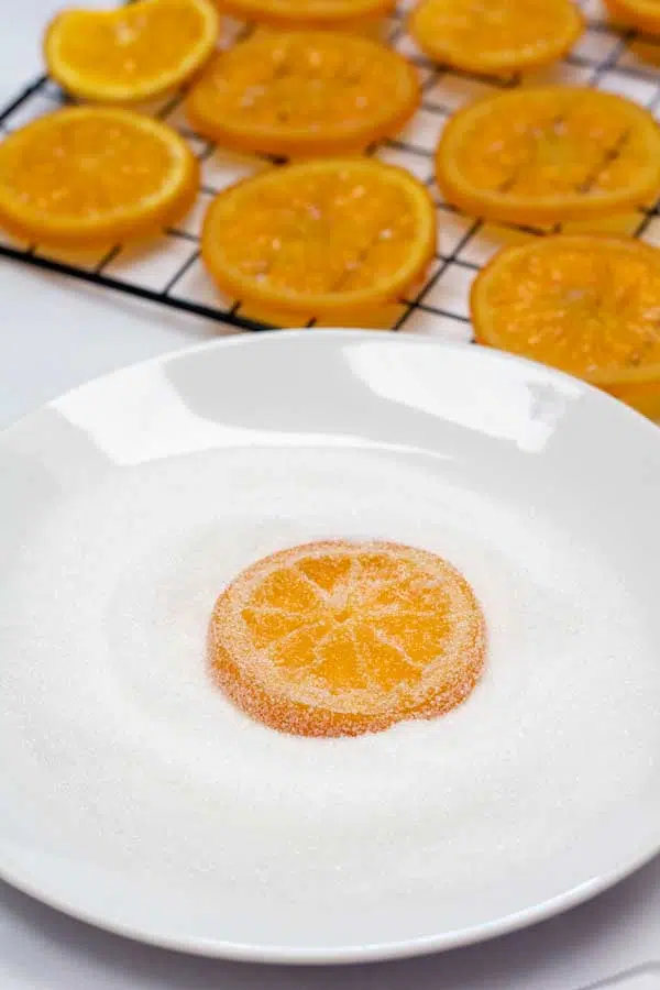 Process photo 6 showing sliced oranges opposite side in sugar.