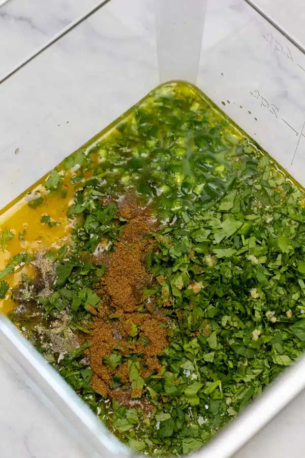 Process image 1 showing marinade ingredients in container.