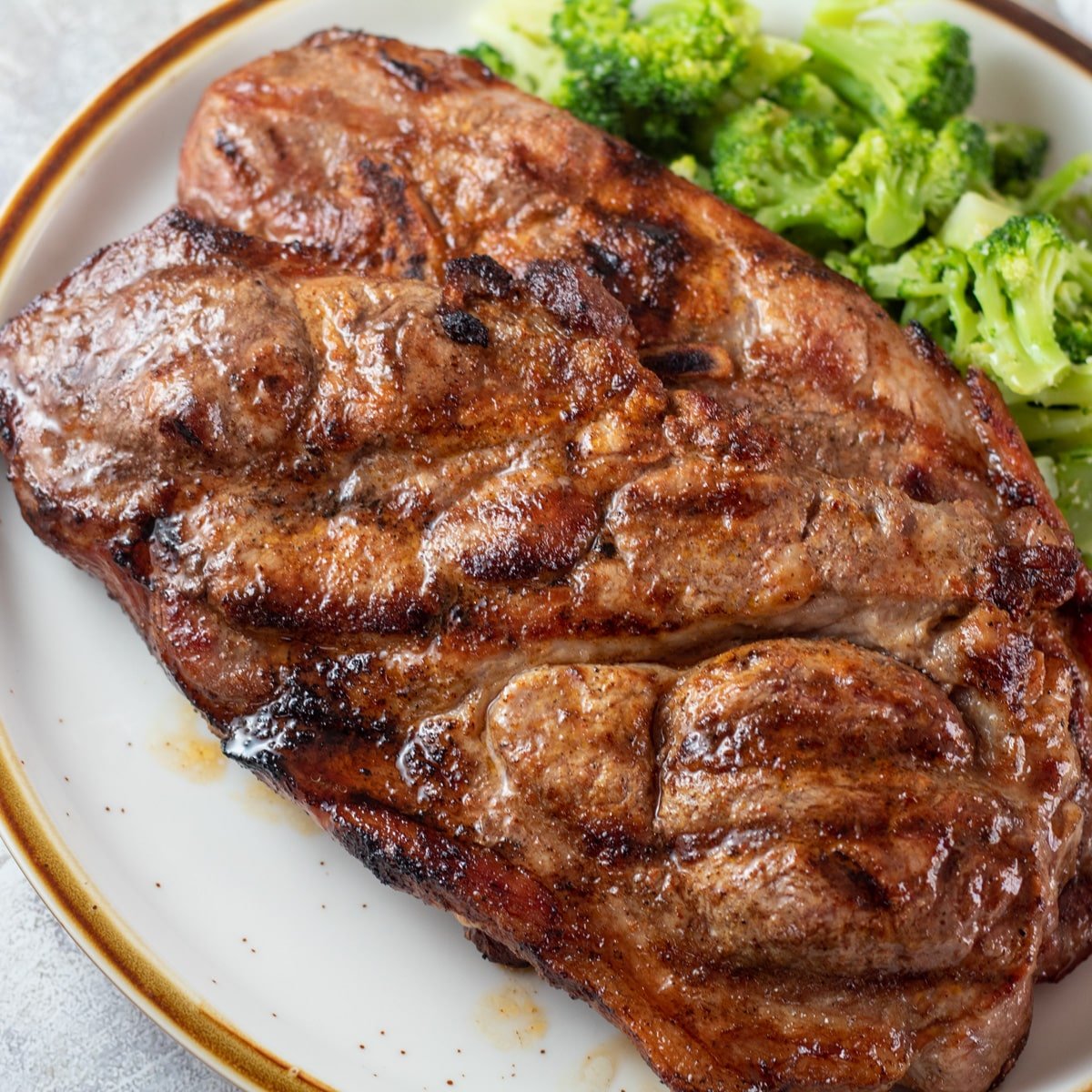 Grilled Pork Steaks: Easy Barbecued Pork Blade Steak Dinner!