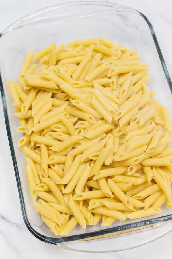 Process photo 8 showing pasta in baking dish.
