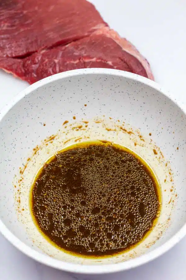 Process photo 2 showing marinade mixed in a bowl.