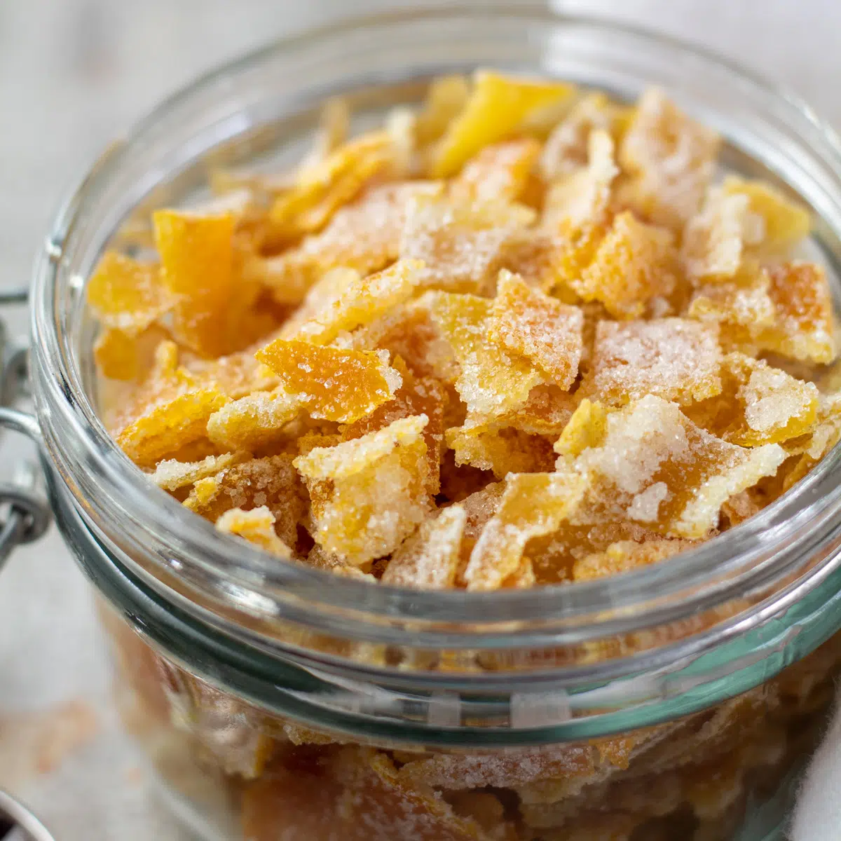 Easy mixed peel chopped after drying with a coating of sugar then stored in a glass jar.