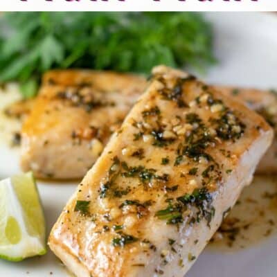 Pan seared mahi mahi with cilantro lime butter sauce on white plate and text title for the pin image.
