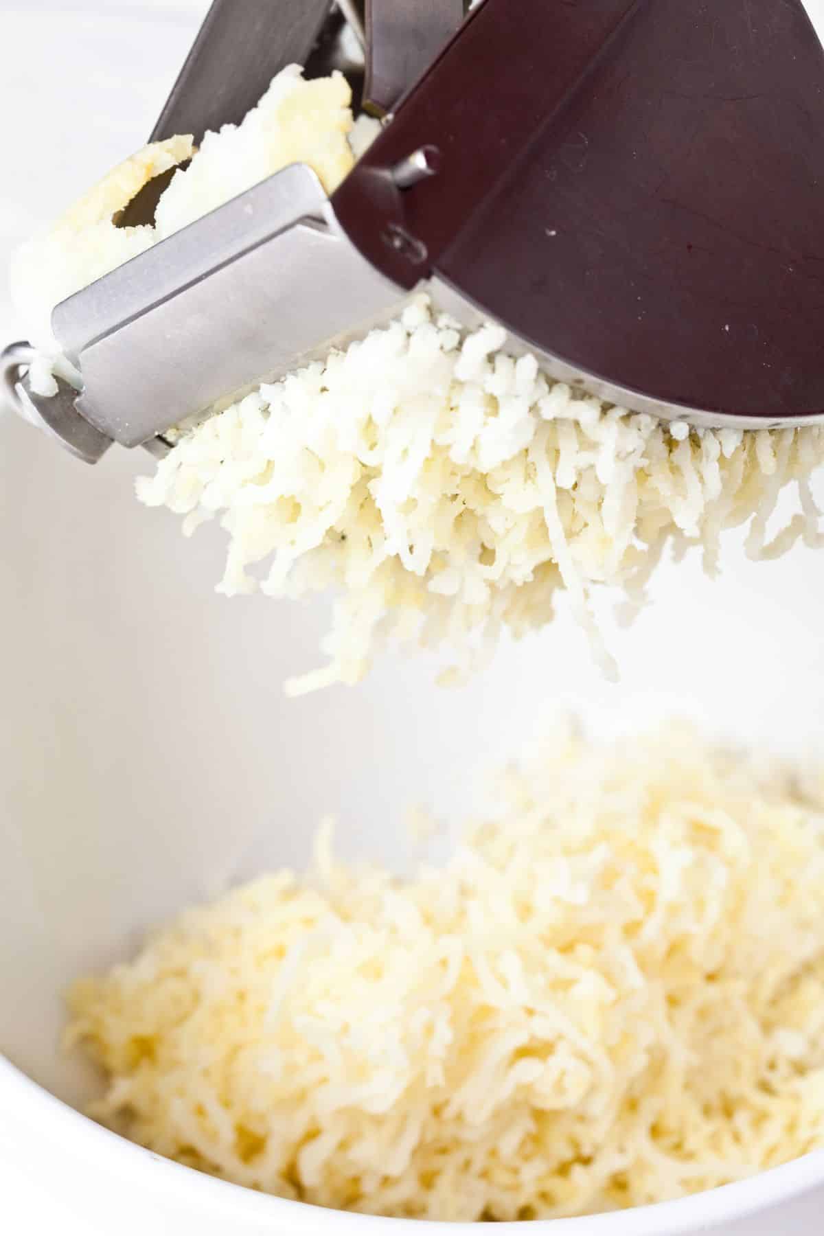 It is optional to use a ricer, but this will yield the very best mashed potato consistency.