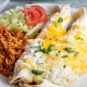 Square image showing plate of sour cream enchiladas.