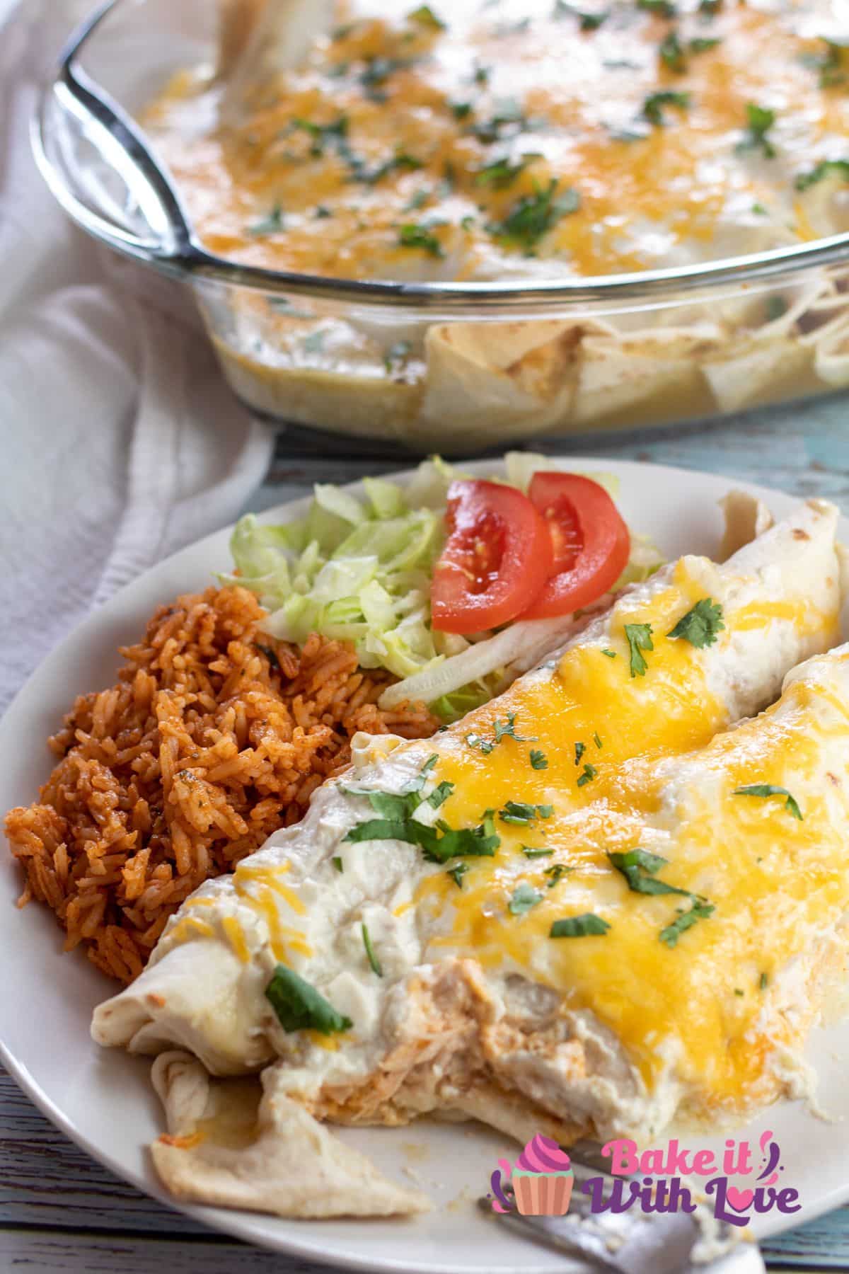 Tall image showing plate of sour cream enchiladas.