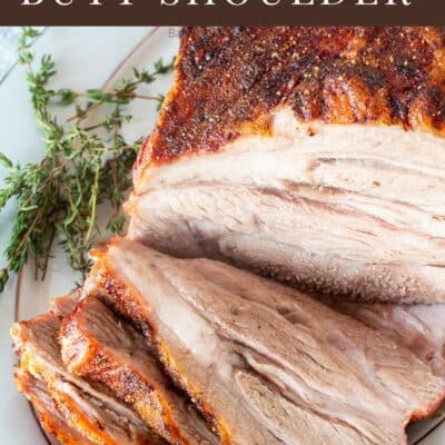 Pin image with text of pork shoulder butt roast on a serving dish sliced.