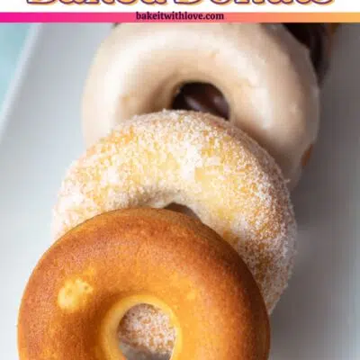 Pin image with text of an assortment of baked donuts.