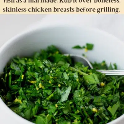 Pin image with text of gremolata in a small white bowl.