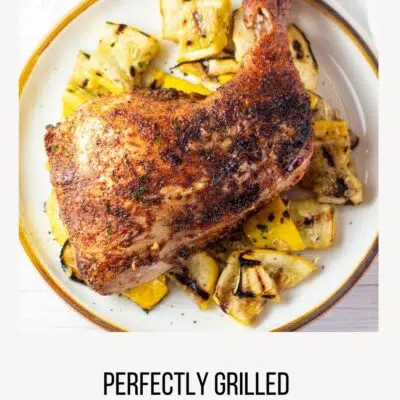Pin image with text of grilled chicken leg quarters over sauteed yellow squash.