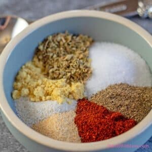 Square image of pork roast seasoning in a small bowl.