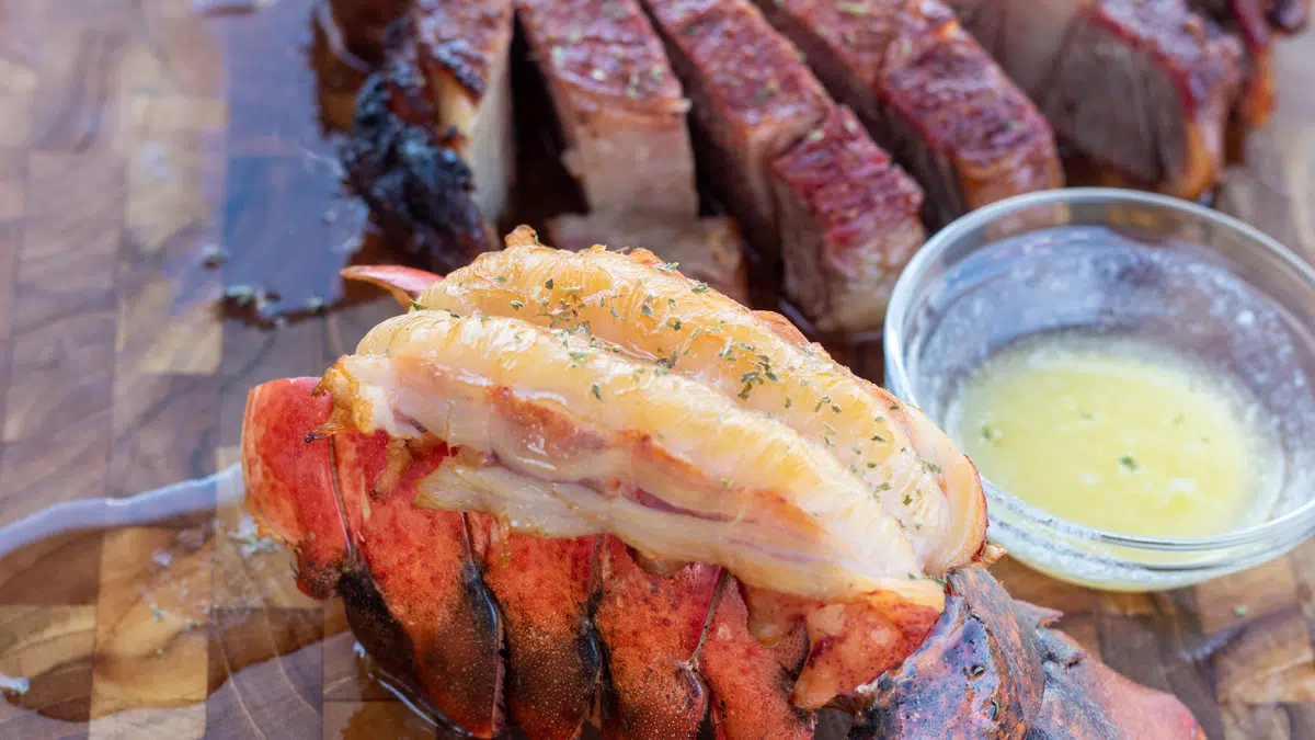 Wide image of smoked surf and turf.