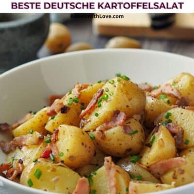 Pin image with text of german potato salad in a white bowl.