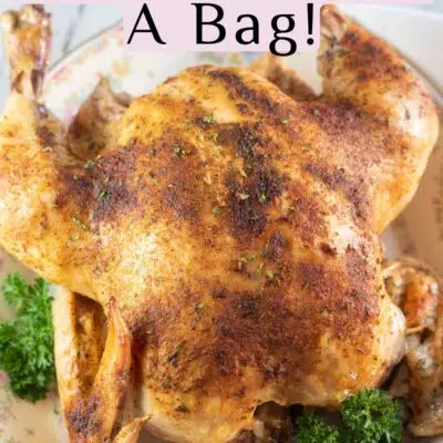 Pin image with text of bage roasted chicken on a platter with parsley.
