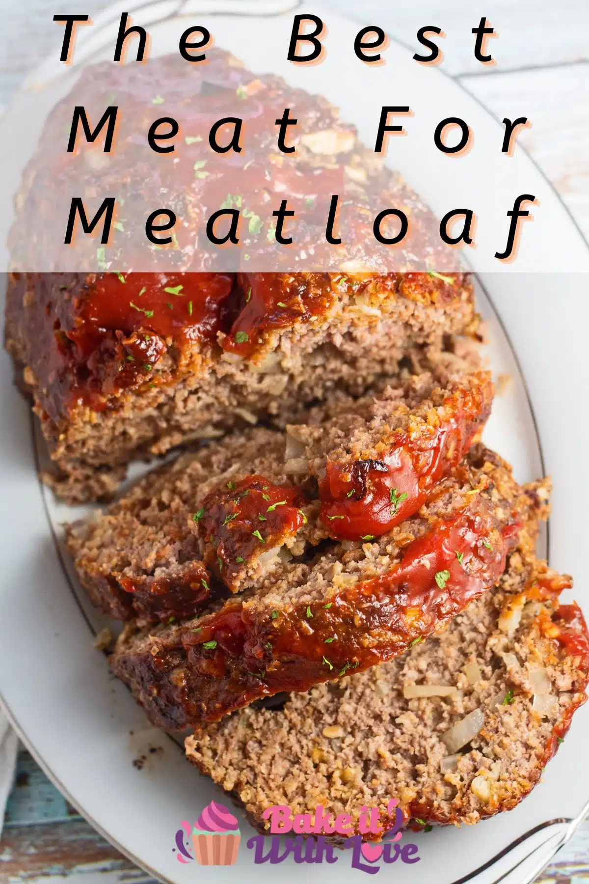 Pin image with text of meatloaf on a white serving platter.