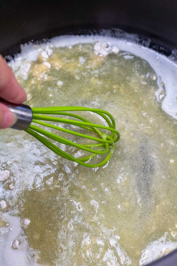 Process image 2 showing whisking flour into melted butter.