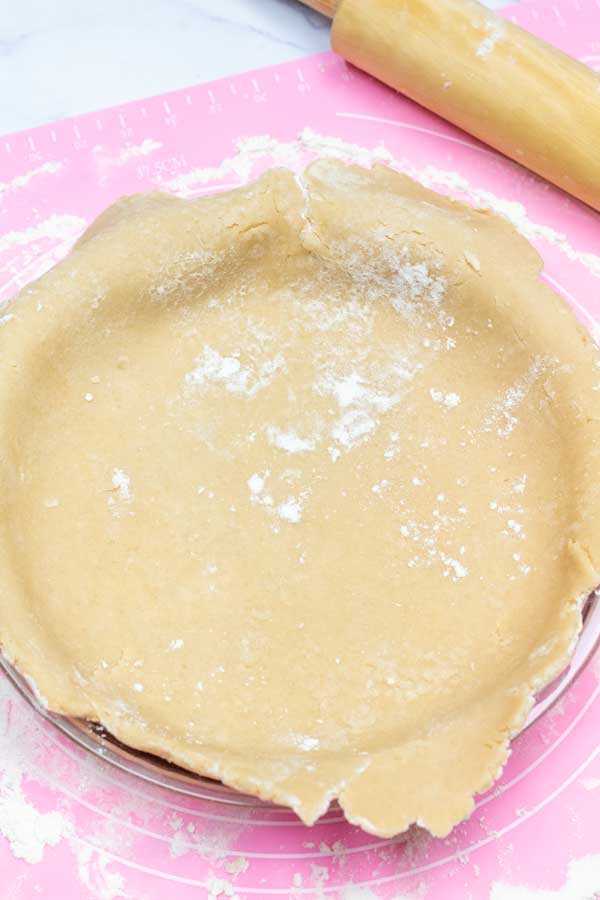 Process image 4 showing pie dough in baking dish.