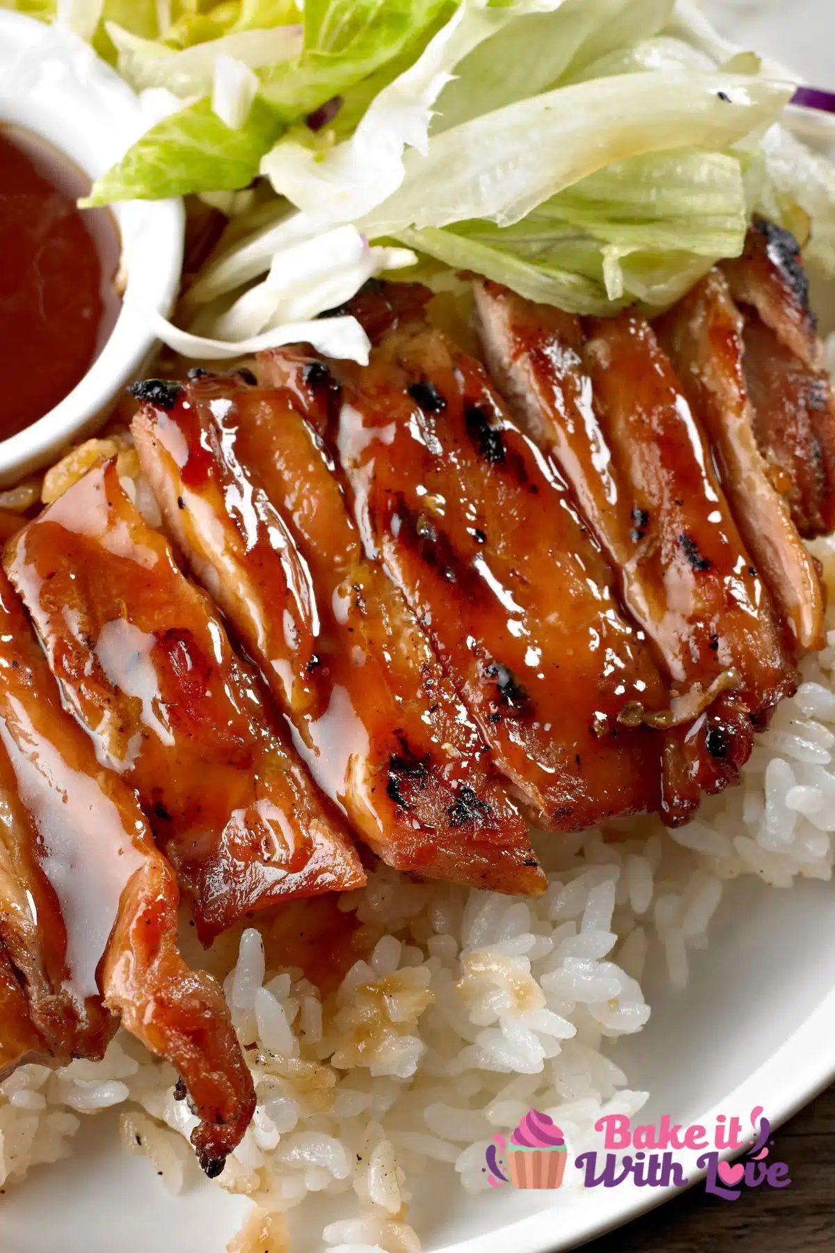 Best tasty Panda Express teriyaki chicken sliced and served with rice and cabbage.