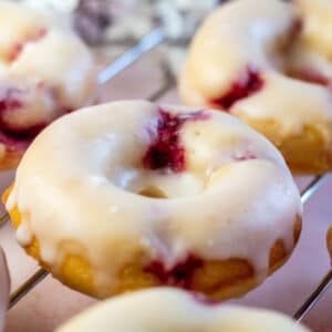 Square image of raspberry lemon baked donuts.