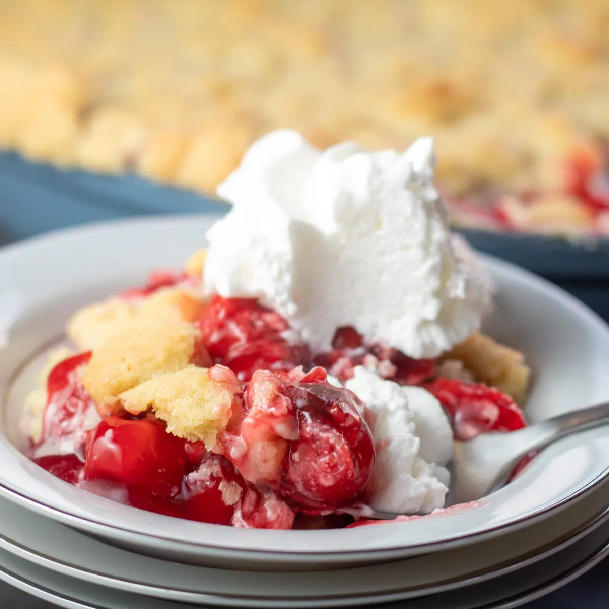Square image of sugar cookie cherry cobbler.
