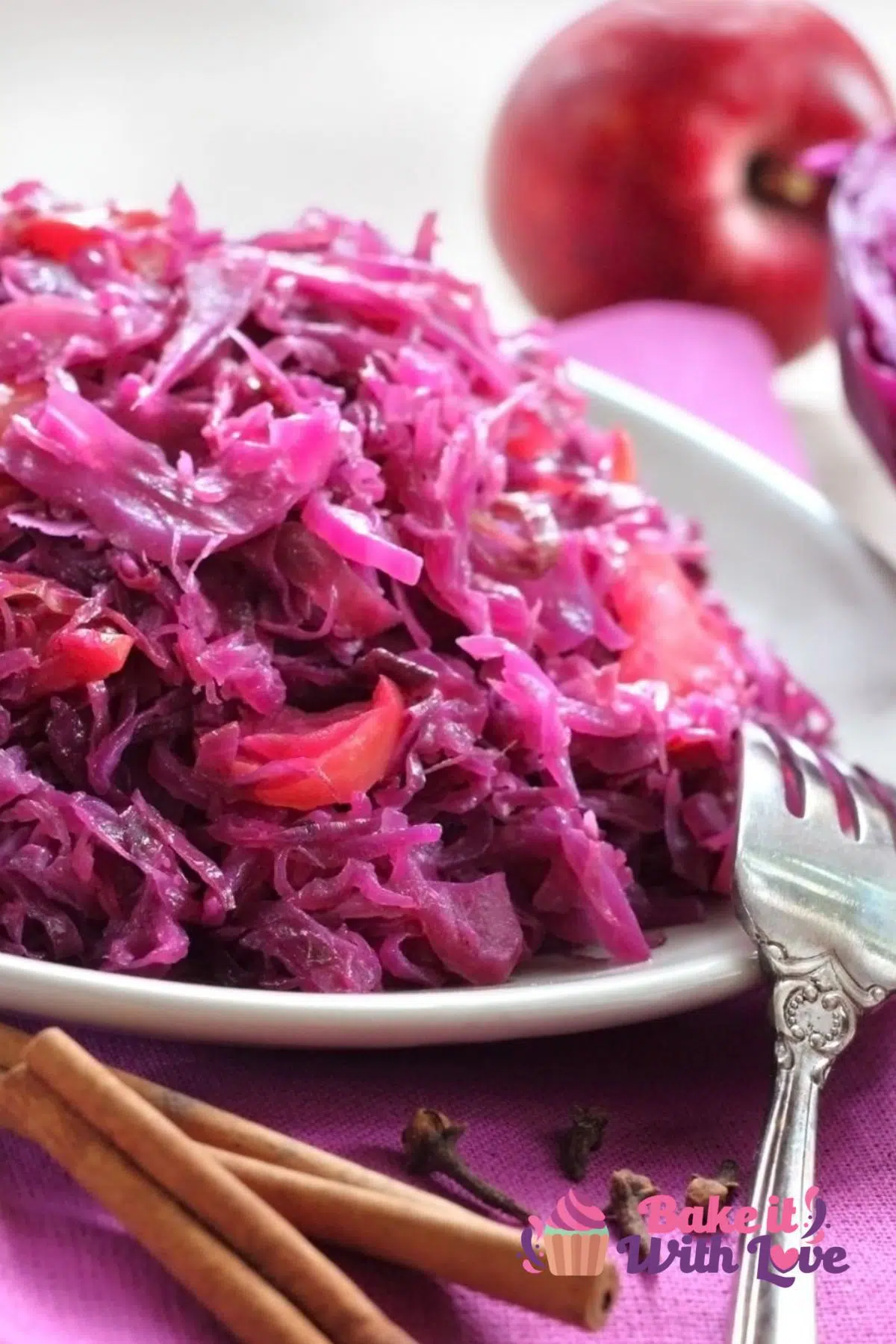 Tall image of sweet and sour red cabbage on a serving dish.
