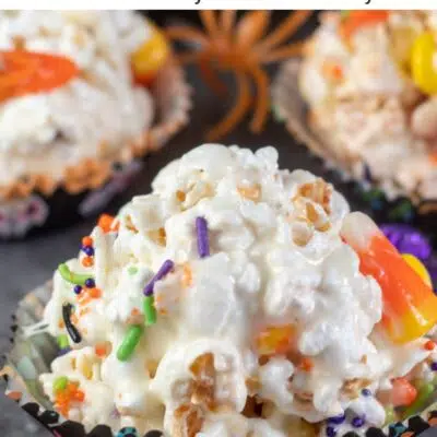 Pin image with text of Halloween popcorn balls.