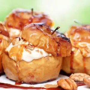 Square image of baked apples.