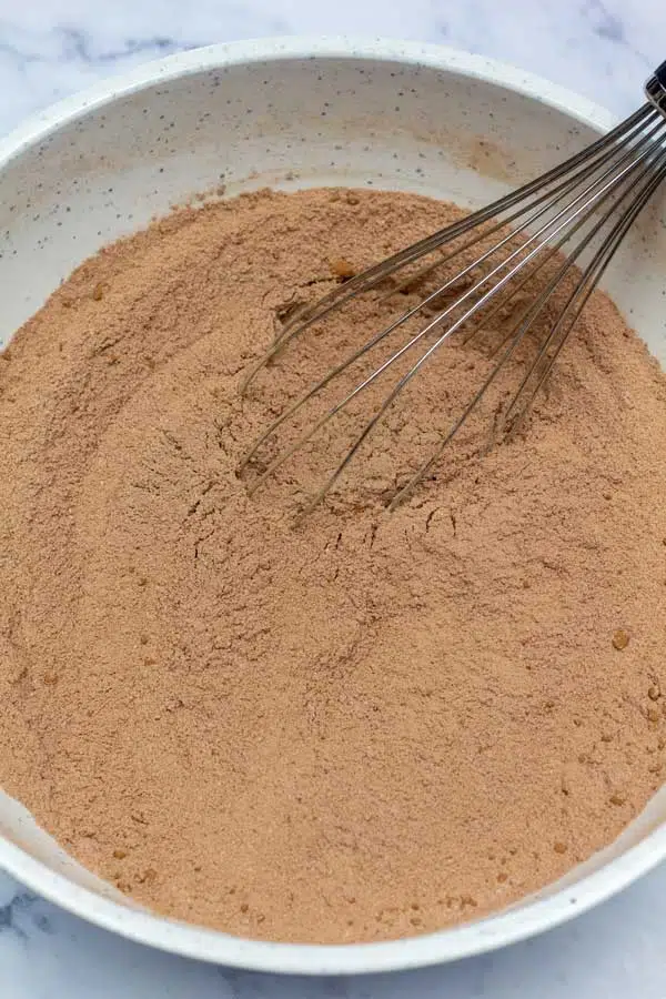Process image 2 showing combined dry ingredients in a mixing bowl.