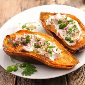 Square image microwave baked sweet potatoes.