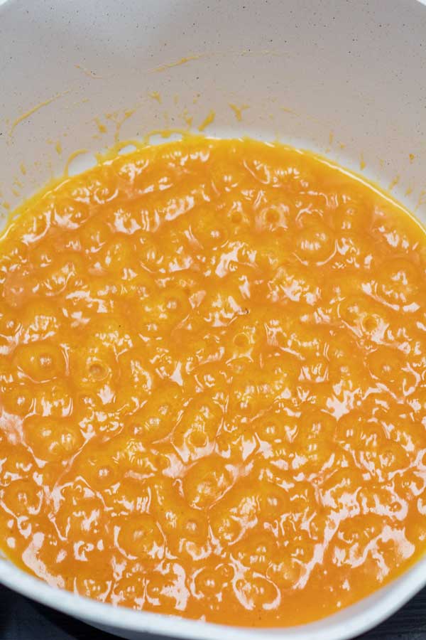 Process image 4 showing pumpkin sugar mix cooking.