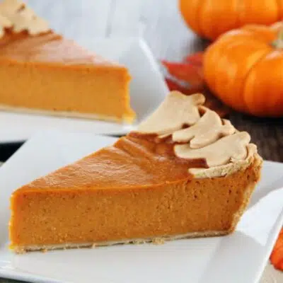 Square image of a slice of pumpkin pie.