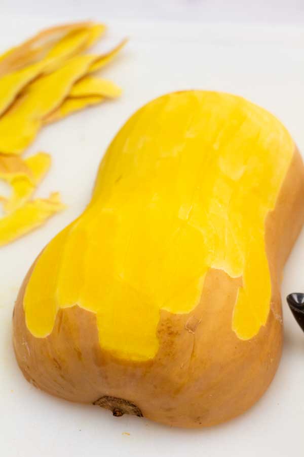 Process image 3 showing butternut squash during peeling of the skin.