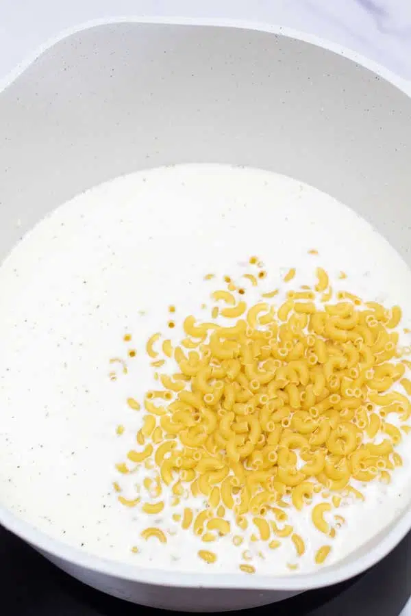 Process image 2 showing adding macaroni.